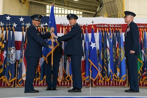 Col. Michael Walters relinquishes command of the 5th Bomb Wing to Col. Daniel Hoadley at Minot Air Force Base, N.D., June 23, 2022.