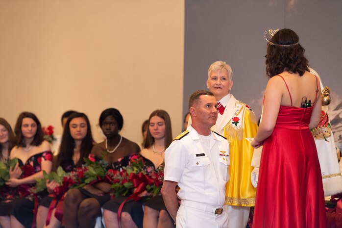 Rear Adm. Mark Sucato, commander, Navy Region Northwest, becomes an Honorary Sir Knight at the annual Royal Rosarian Honorary Knighting Ceremony during Portland Fleet Week in Oregon, June 10, 2022. Portland Fleet Week is a time-honored celebration of the sea services and provides an opportunity for the citizens of Oregon to meet Sailors, Marines and Coast Guardsmen, as well as witness firsthand the latest capabilities of today's maritime services. (U.S. Navy photo by Mass Communication Specialist Seaman Apprentice Sophia H. Brooks)