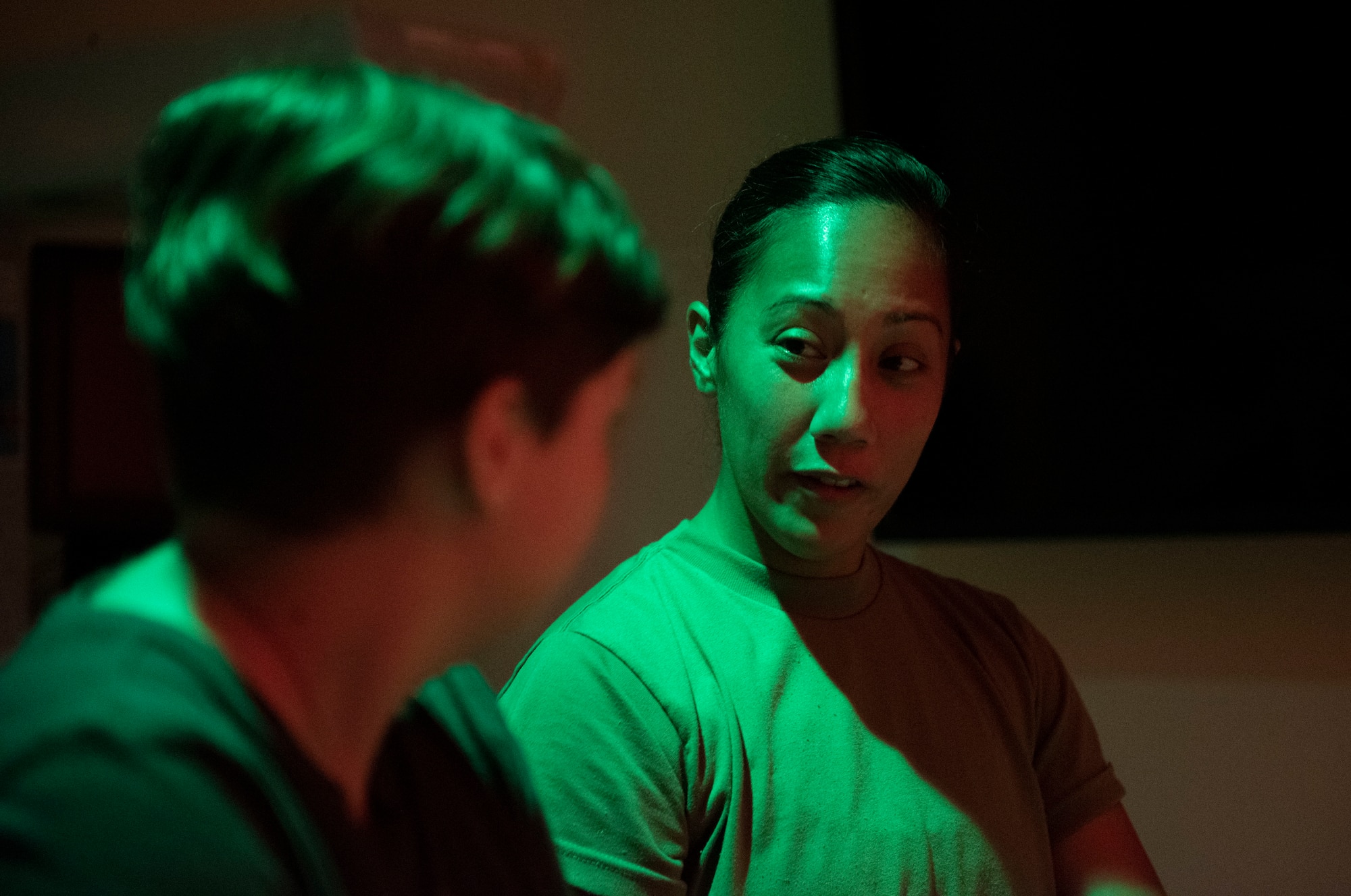 U.S. Air Force Tech. Sgt. Andrea Miles, 23rd Medical Group, ambulance response center NCOIC, explains her job during Teen Shadow Day at Moody Air Force Base, Georgia, June 22, 2022. Teen Shadow Day aims to open doors for Moody Youth Center teens and show them possible job opportunities in the military and private sector. (U.S. Air Force photo by Staff Sgt. Thomas Johns)