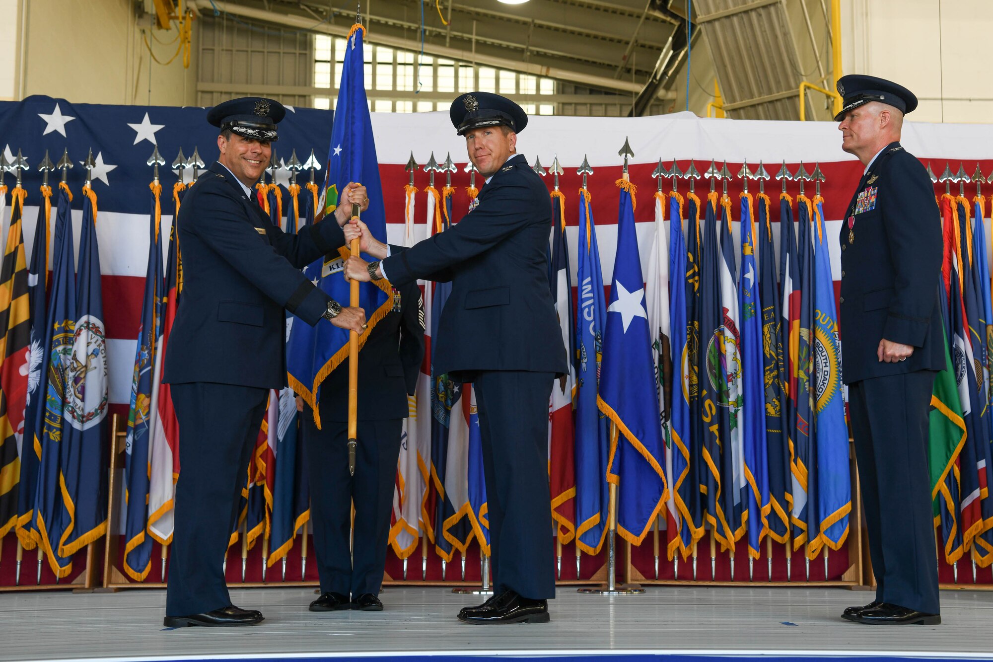 Col. Michael Walters relinquishes command of the 5th Bomb Wing to Col. Daniel Hoadley at Minot Air Force Base, N.D., June 23, 2022.