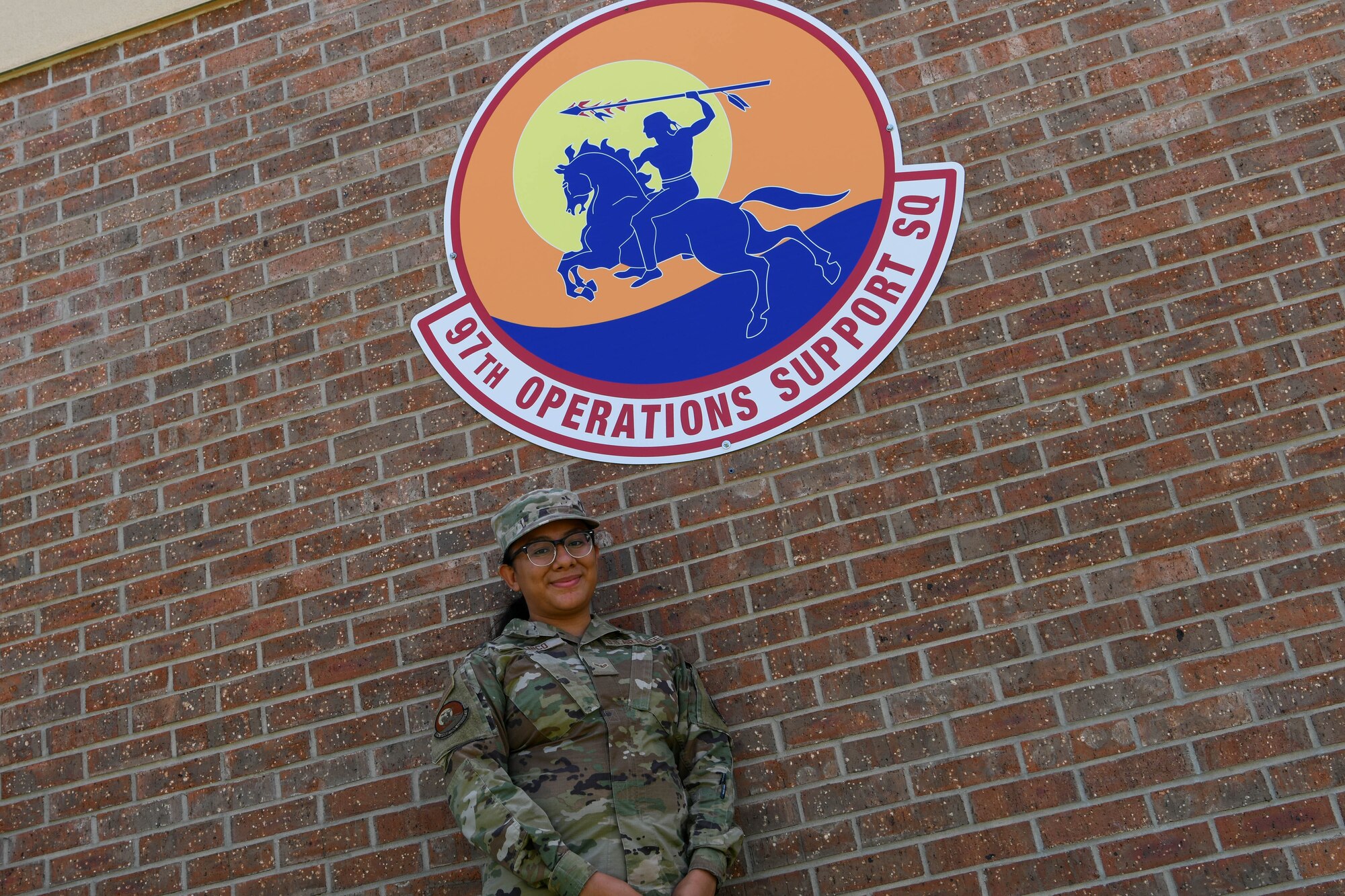 U.S. Air Force Airman 1st Class Maria Juanico, 97th Operations Support Squadron intel analyst, poses for a photo at Altus Air Force Base (AAFB), Oklahoma, June 14, 2022. Airmen are first introduced to the Airmen and Family Readiness Center and the services it provides during the First Term Airmen Course. (U.S. Air Force photo by Airman 1st Class Trenton Jancze)