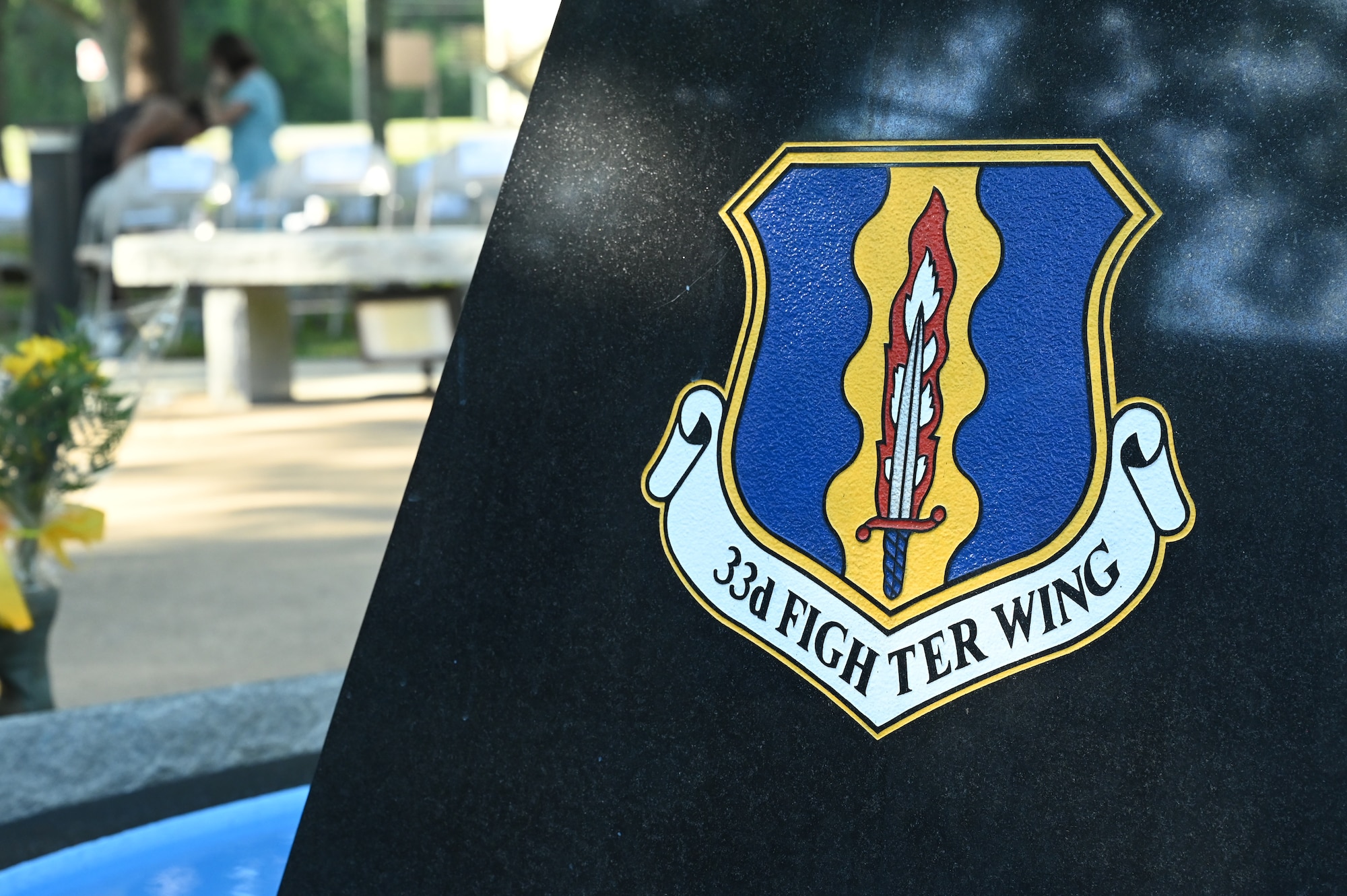 Members with the 33rd Fighter Wing participate in the 26th Annual Khobar Towers Anniversary Memorial Ceremony at Eglin Air Force Base, Florida, June 23, 2022.