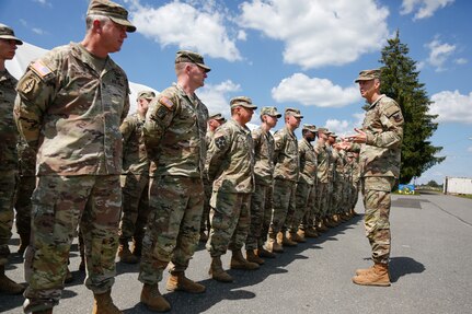 Army Gen. Daniel Hokanson, chief, National Guard Bureau, talks with a formation of Soldiers with the 53rd Infantry Brigade Combat Team, Florida National Guard, in Grafenwoehr, Germany, June 12, 2022. Germany was Hokanson’s second stop on a five-nation trip to recognize and strengthen National Guard relationships with European allies and partners.