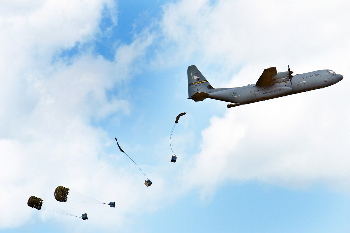 U.S. Air Force C-130 Hercules aircraft from the 130th Airlift Wing, McLaughlin Air National Guard Base, Charleston, West Virginia, perform an airdrop during Agile Combat Employment  training during Agile Rage 22, Alpena Combat Readiness Training Center, Mich., June 10, 2022. ACE is the ability to project combat power anytime, anywhere, while remaining operationally unpredictable to complicate an adversary's decision making process.