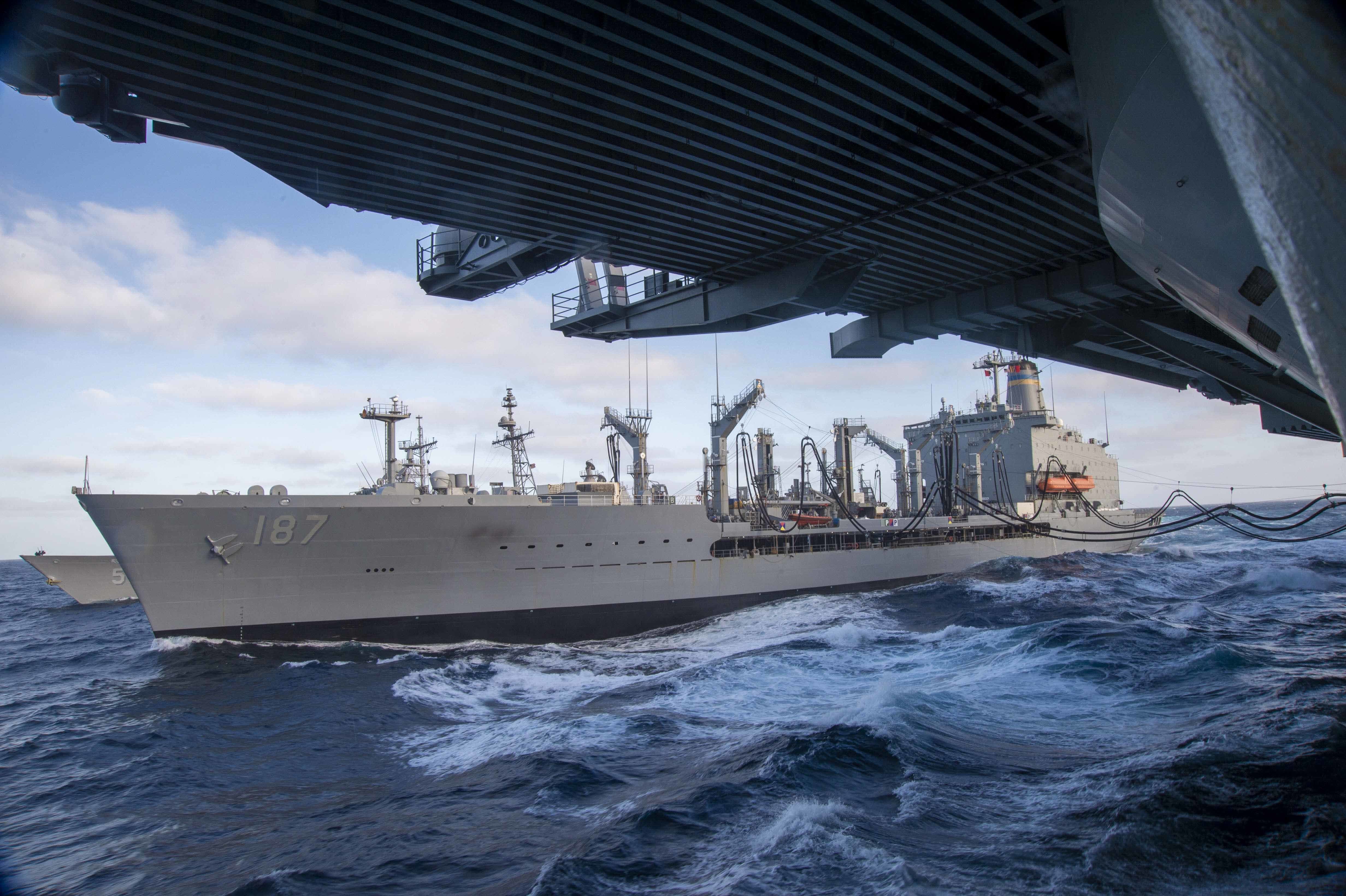 The Nimitz-class aircraft carrier USS Nimitz (CVN 68) conducts a refueling-at-sea with the fleet replenishment oiler USNS Henry J. Kaiser (T-AO 187), June 17, 2022.