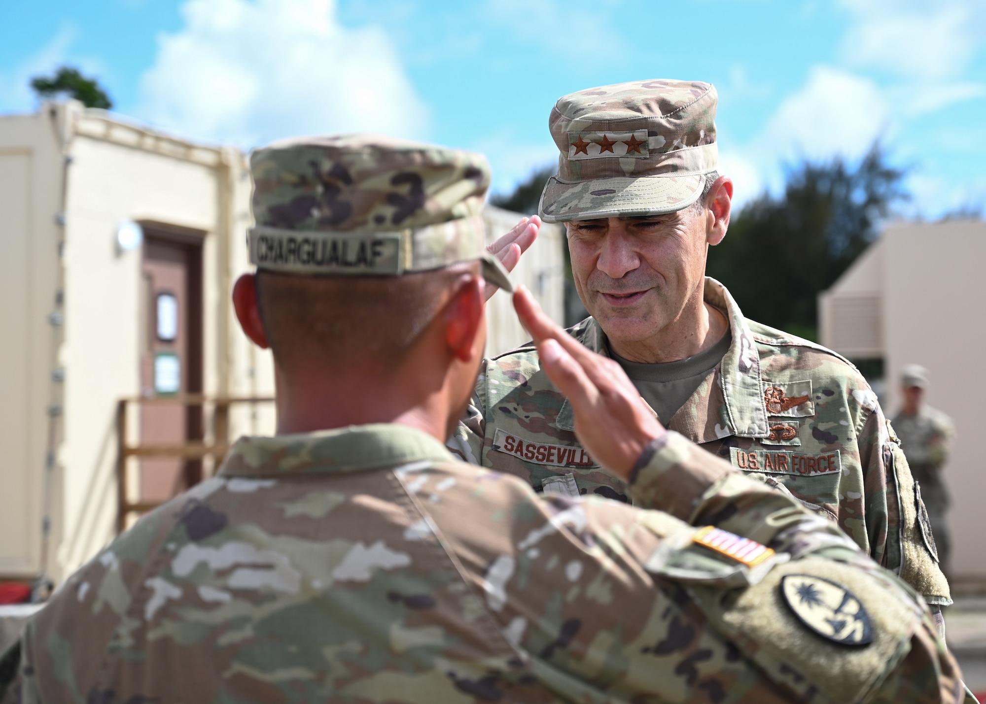 U.S. Air Force Lt. Gen. Marc Sasseville, vice chief of the National Guard Bureau, salutes a U.S. Army soldier at Andersen Air Force Base, Guam, June 22, 2022.
