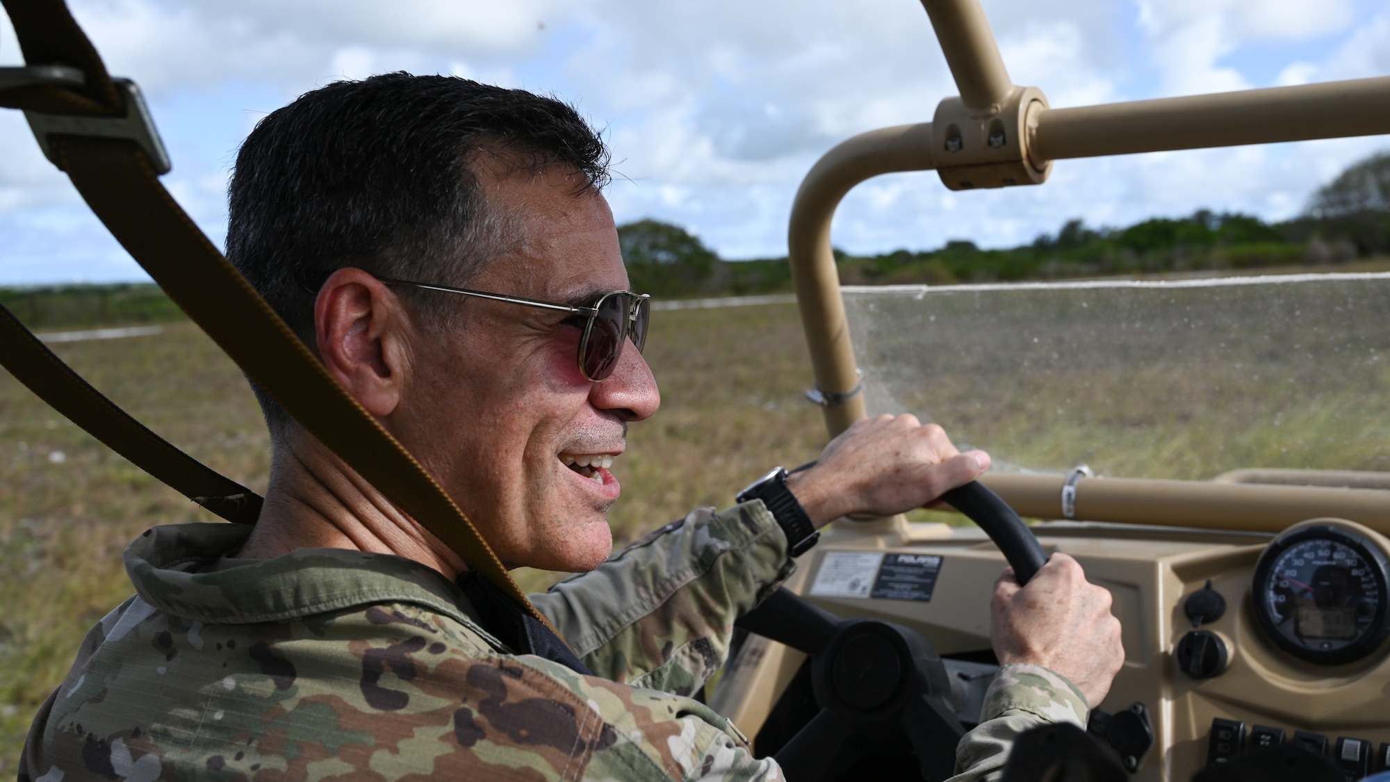U.S. Air Force Lt. Gen. Marc Sasseville, vice chief of the National Guard Bureau, drives a light tactical all-terrain vehicle, MZRZ, during a tour on Andersen Air Force Base, Guam, June 22, 2022.