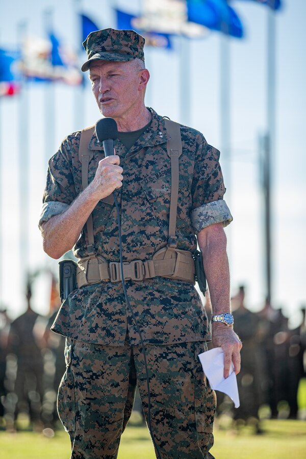 U.S. Marine Corps Maj. Gen. William J. Bowers, outgoing commanding general, Marine Corps Installations Pacific, Marine Corps Base Camp Butler, gives remarks during a change of command ceremony outside of MCIPAC’s Headquarters Building, Camp Foster, Okinawa, Japan, on June 24, 2022. Change of command ceremonies allow individuals to witness the official passing of authority change between officers. During the ceremony, the outgoing commander passes the unit’s guidon to the incoming commander, symbolizing the transfer of authority, responsibility, and total commitment to all Marines and Sailors. (U.S. Marine Corps photo by Cpl. Alex Fairchild)
