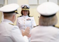 220615-N-OX321-1367 NAVAL AIR STATION SIGONELLA, Italy (June 15, 2022)— Capt. Jean Fisak, commanding officer, U.S. Navy Medicine Readiness & Training Command Sigonella, is applauded during the USNMRTC Sigonella change of command ceremony on Naval Air Station Sigonella, June 15, 2022. During the change of command ceremony Capt. Jean Fisak relieved Capt. Denise Gechas as the commanding officer of USNMRTC Sigonella. NAS Sigonella’s strategic location enables U.S., allied, and partner nation forces to deploy and respond as required, ensuring security and stability in Europe, Africa and Central Command. (U.S. Navy photo by Mass Communication Specialist 1st Class Kegan E. Kay)