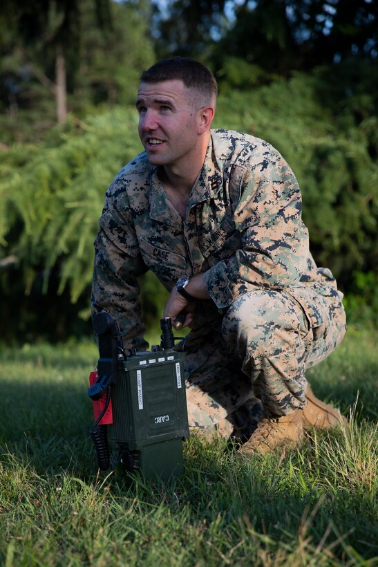 U.S. Marine Corps Capt. James Case, an infantry officer with 2d Battalion, 8th Marine Regiment, 2d Marine Division, practices setting up a radio during the Division Leader Assessment Program on Fort A.P. Hill, Virginia, June 20, 2022. This assessment program also provides Marines with learning and mentorship opportunities, which helps train and develop Marines that demonstrate an apex level of lethality, endurance and comprehensive warfighting ability. (U.S. Marine Corps photo by Cpl. Michael Virtue)