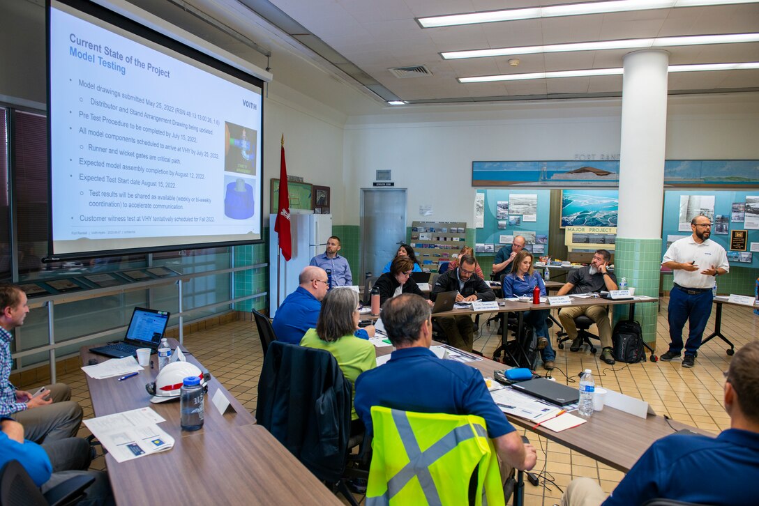Members of the U.S. Army Corps of Engineers Omaha District and the Voith group discuss their new collaboration project on the hydropower plant project at the Fort Randall Dam, South Dakota, June 7, 2022. The meeting allowed for discussion of the project and partnership, reviewing of outcomes from the pre-session survey, and identifying project key success factors, among other things. (U.S. Army Corps of Engineers Photo by Jason Colbert)
