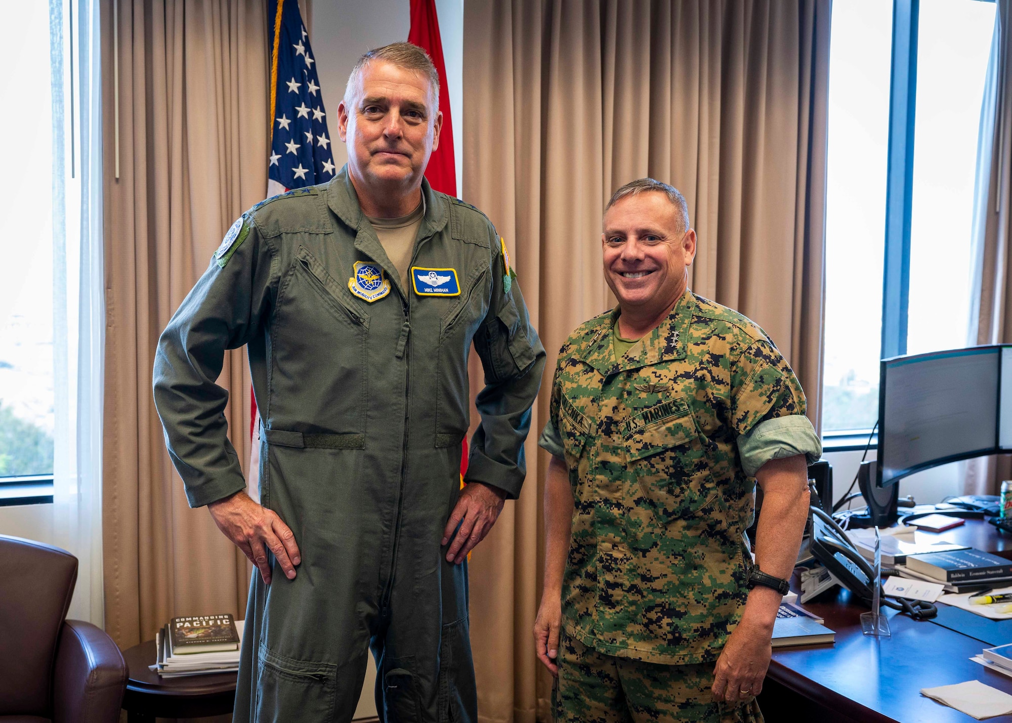 CAMP H.M. SMITH, Hawaii (June 23, 2022) Gen. Michael Minihan, Commander of Air Mobility Command, left, and Lt. Gen. Stephen D. Sklenka, Deputy Commander of U.S. Indo-Pacific Command, pose for a photo during a meeting at USINDOPACOM headquarters. AMC leaders met with USINDOPACOM as well as their Pacific Air Forces counterparts to present a road map for readying Mobility Air Forces for Agile Combat Employment in the Indo-Pacific theater.(U.S. Navy photo by Mass Communication Specialist 1st Class Anthony J. Rivera)