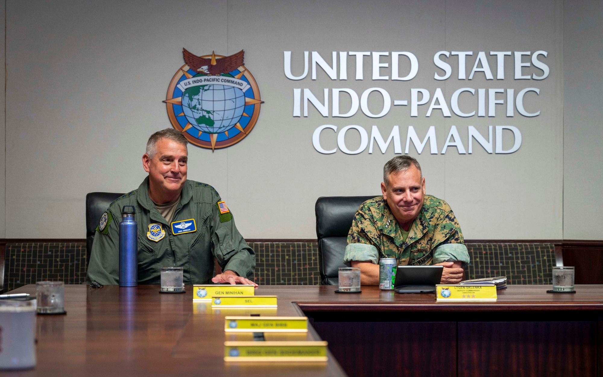 CAMP H.M. SMITH, Hawaii (June 23, 2022) Gen. Michael Minihan, Commander of Air Mobility Command, left, and Lt. Gen. Stephen D. Sklenka, Deputy Commander of U.S. Indo-Pacific Command, attend a meeting during a visit to USINDOPACOM headquarters. AMC leaders met with USINDOPACOM as well as their Pacific Air Forces counterparts to present a road map for readying Mobility Air Forces for Agile Combat Employment in the Indo-Pacific theater. (U.S. Navy photo by Mass Communication Specialist 1st Class Anthony J. Rivera)