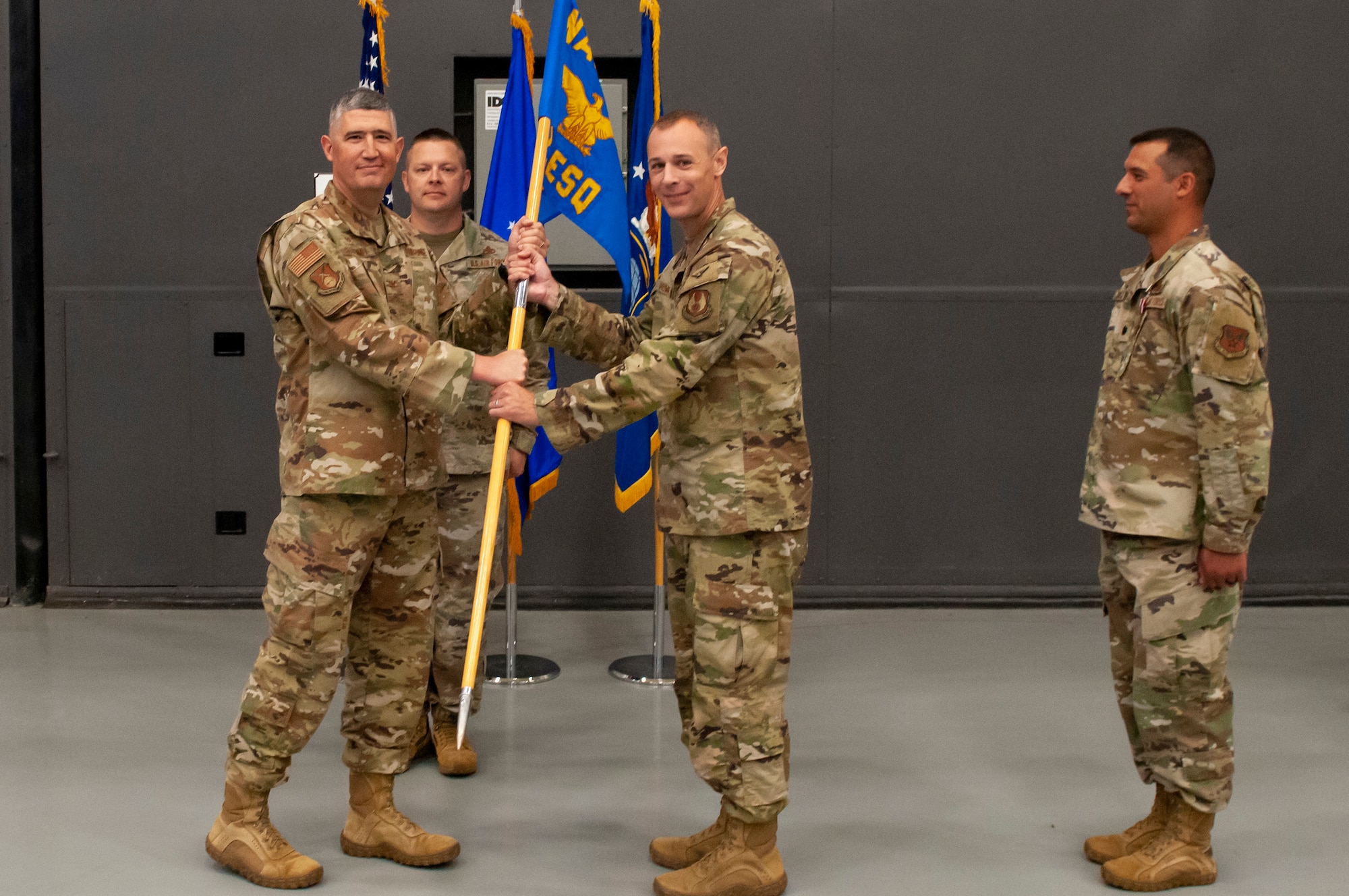 Lt. Col. Noel Humber Foreign Materiel Exploitation commander, accepts the guidon from Col. Kenneth Stremmel, Global Exploitation Intelligence commander during the Foreign Materiel Exploitation change of command June 6, 2022 here. Humber previously worked at the Air Force Research Laboratory, Systems Technology Office, before taking over the Foreign Materiel Exploitation squadron. The Foreign Materiel Exploitation is tasked with delivering unique, timely, and detailed foreign materiel exploitation intelligence on air, space and cyberspace system capabilities and vulnerabilities to support operational efforts, acquisition programs, and policy decisions.