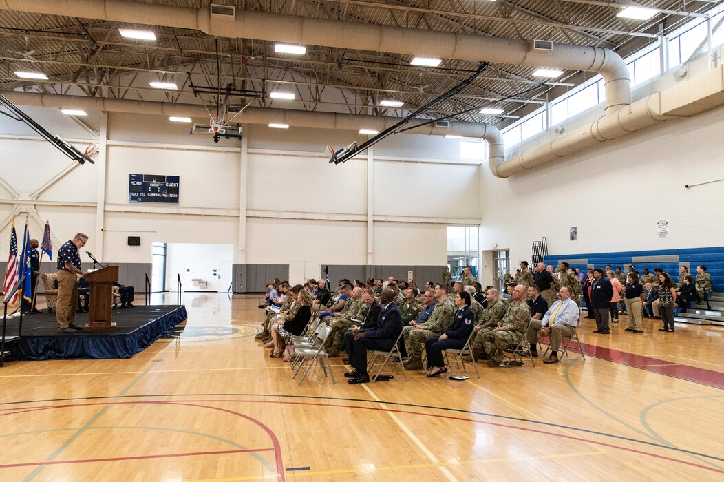 Team Dover Airmen, family members and guests witness the 436th Force Support Squadron Change of Command ceremony held at the base fitness center on Dover Air Force Base, Delaware, June 24, 2022. Outgoing commander, Lt. Col. Kady Griffin, relinquished command to Lt. Col. Donald Johnson III. The presiding officer for the ceremony was Col. Phelemon Williams, 436th Mission Support Group commander. (U.S. Air Force photo by Roland Balik)