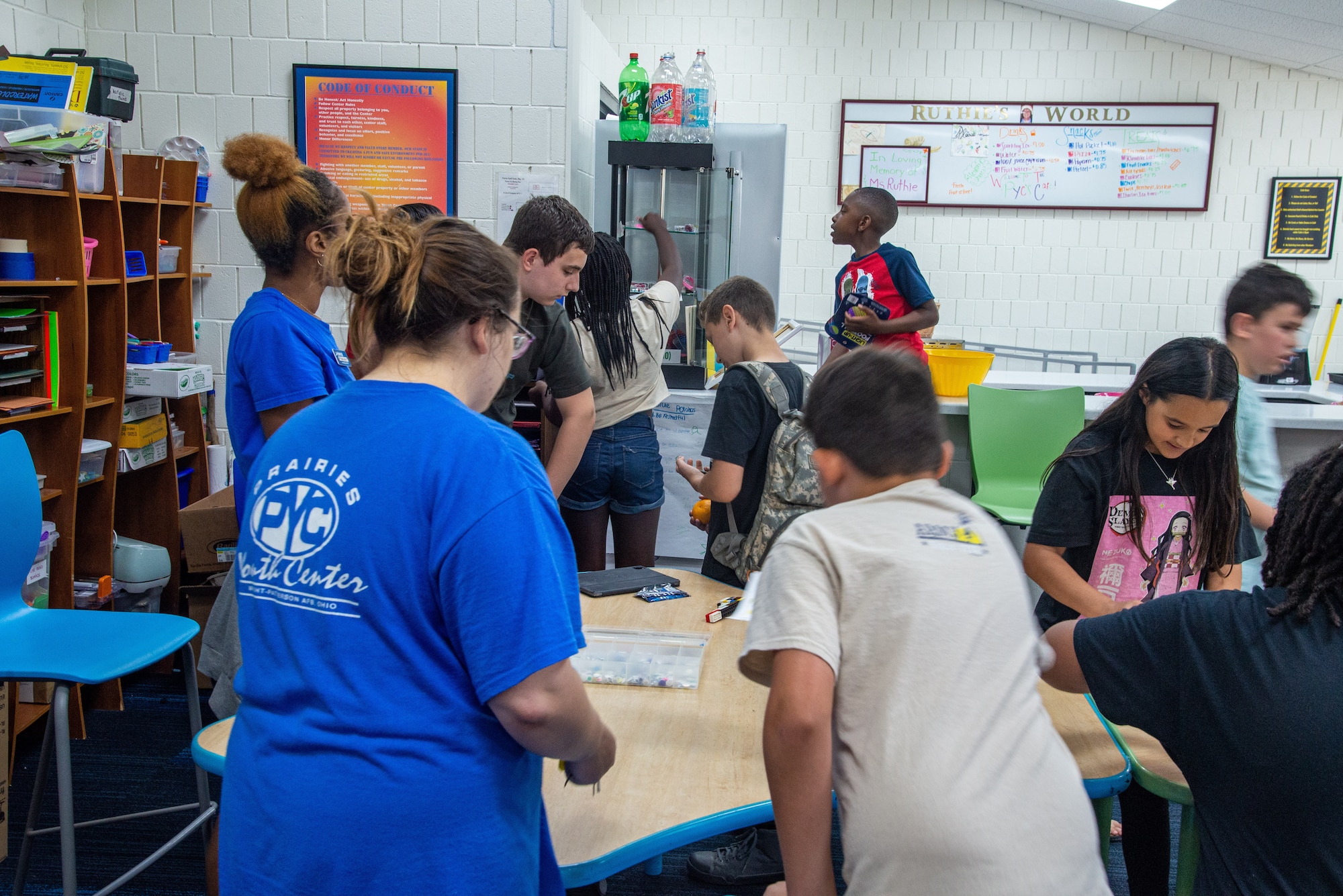 Children at the Prairies Youth Center enjoy an arts and crafts activity at the Prairies Youth Center (PYC) June 22, 2022. The PYC offers a wide variety of clubs and activities for youth ages 9 to 18. (U.S. Air Force photo by Airman 1st Class James Johnson)