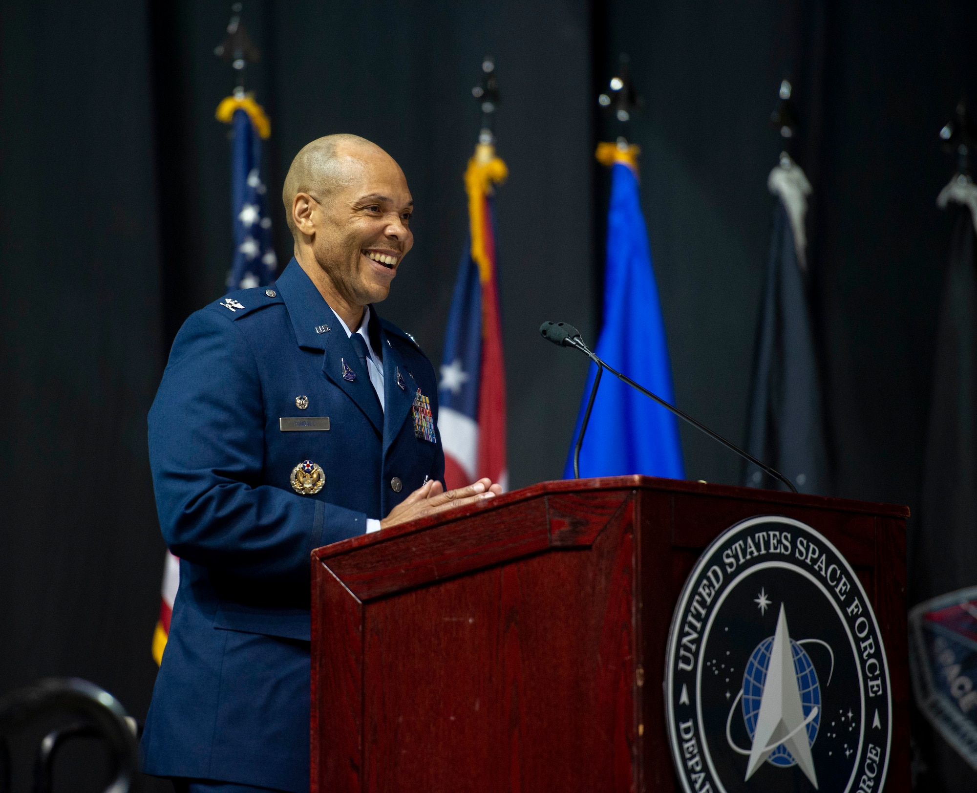 U.S. Space Force Colonel Marqus Randall, Space Delta 18 commander, share remarks at the activation ceremony for Space Operations Command's newest Delta, Space Delta 18, and established the National Space Intelligence Center (NSIC) at the Nutter Center, Dayton, Ohio, June 24, 2022. Space Delta 18 is named in honor of the U.S. Space Force's role as the 18th member of the intelligence community. Delta 18 will deliver critical intelligence on threat systems, foreign intentions, and activities in the space domain to support national leaders, allies, partners and joint war fighters.( (U.S. Space Force photo by SrA Jack Gardner)