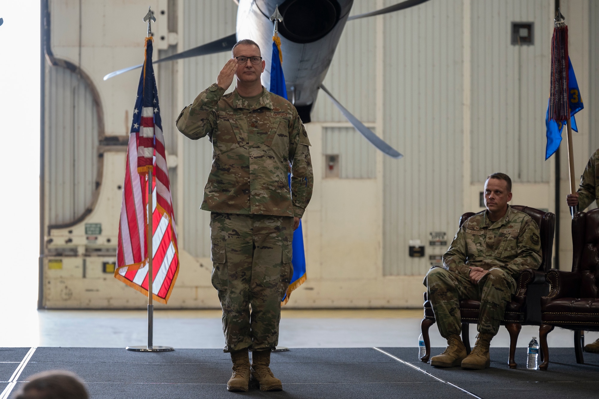 Maj. Daniel Finney,  incoming 317th Maintenance Squadron commander, renders his first salute as commander during a change of command ceremony at Dyess Air Force Base, Texas, 17 June 2022. The 317th MXS’s maintenance backshop responsibilities include fuel cell, propulsion, isochronal inspection, aero repair of key flight control surfaces & landing gear components and propeller valve housing rebuild. (U.S. Air Force photo by Senior Airman Reilly McGuire)