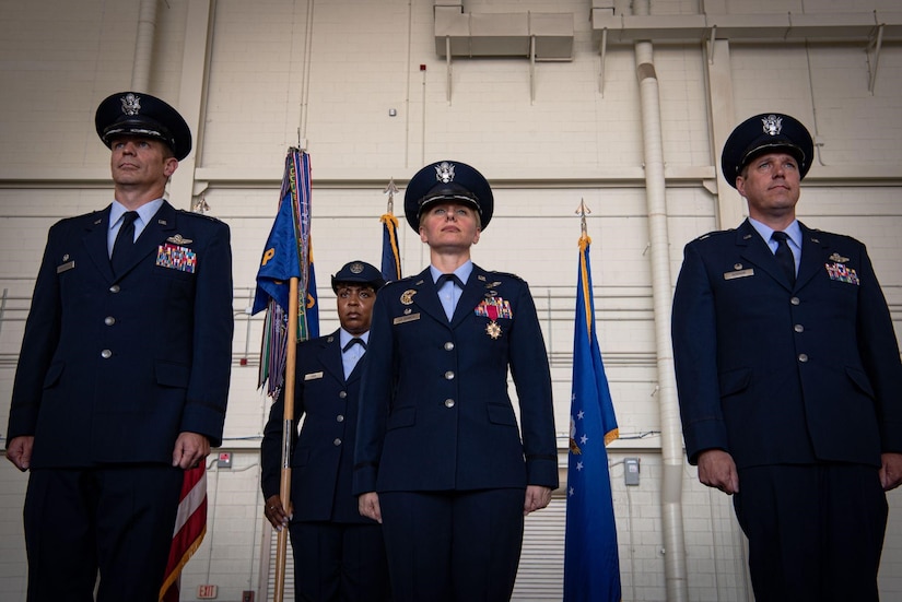 Airmen stand at attention