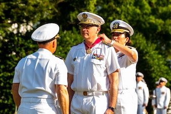 WASHINGTON (June 24, 2022) - Chief of Naval Operations Adm. Mike Gilday presents a Legion of Merit to Chief of the French Navy Adm. Pierre Vandier at the full-honors welcoming ceremony at the Washington Navy Yard, June 23. During his two-day visit, Vandier conducted meetings with senior U.S. Navy leaders to discuss maritime security, interoperability, and readiness. (U.S. Navy photo Mass Communication Specialist 1st Class Michael B. Zingaro)