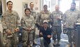 Members of the Alaska State Defense Force assist the Red Cross and Yukon-Kuskokwim Health Corporation in providing essential services to approximately 50 people in the Alaska National Guard armory in Bethel, Alaska, June 18. People from Mt. Village, Pilot Station, Pitkas Point and St. Mary's were relocated to the armory in Bethel as a precaution against wildfires and potential smoke inhalation. (Alaska National Guard Courtesy Photo)