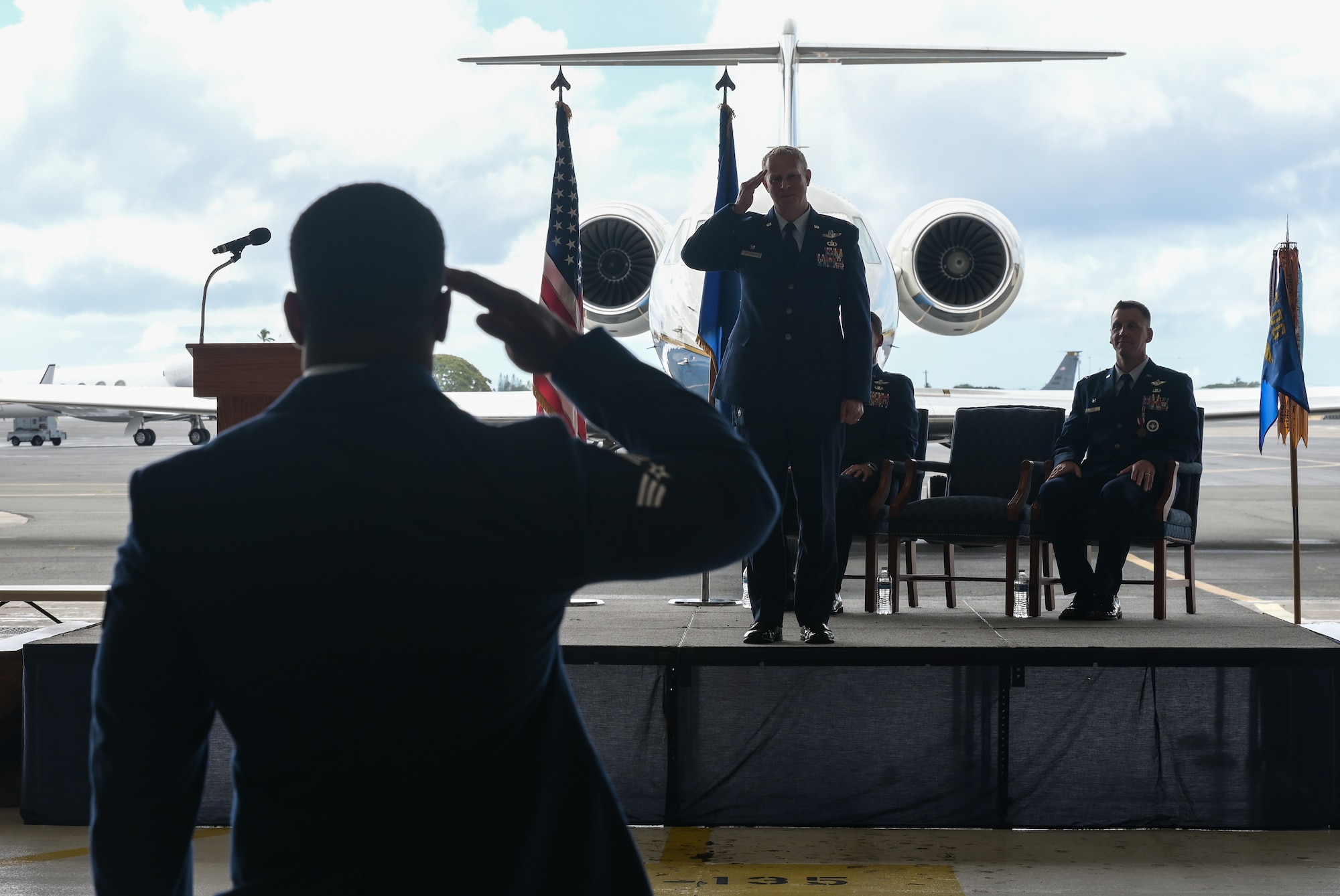 Lt. Col. Daniel Hellinger, 65th Airlift Squadron commander, receives his first salute during a change of command ceremony at Joint Base Pearl Harbor-Hickam, Hawaii, June 24, 2022. Hellinger has been assigned to JBPHH since Oct. 2020, where he served as the 15th Operations Group Director of Staff. (U.S. Air Force photo by Staff Sgt. Alan Ricker)