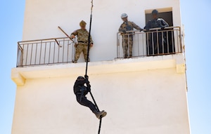 U.S. Army Special Forces Soldiers along with Royal Moroccan Special Operations conduct fast rope training during exercise African Lion 2022 at Tifnit Morocco, Africa, June 22, 2022. AL22 is U.S. Africa Command's largest, premier, joint, combined annual exercise hosted by Morocco, Ghana, Senegal, and Tunisia June 6 - 30.