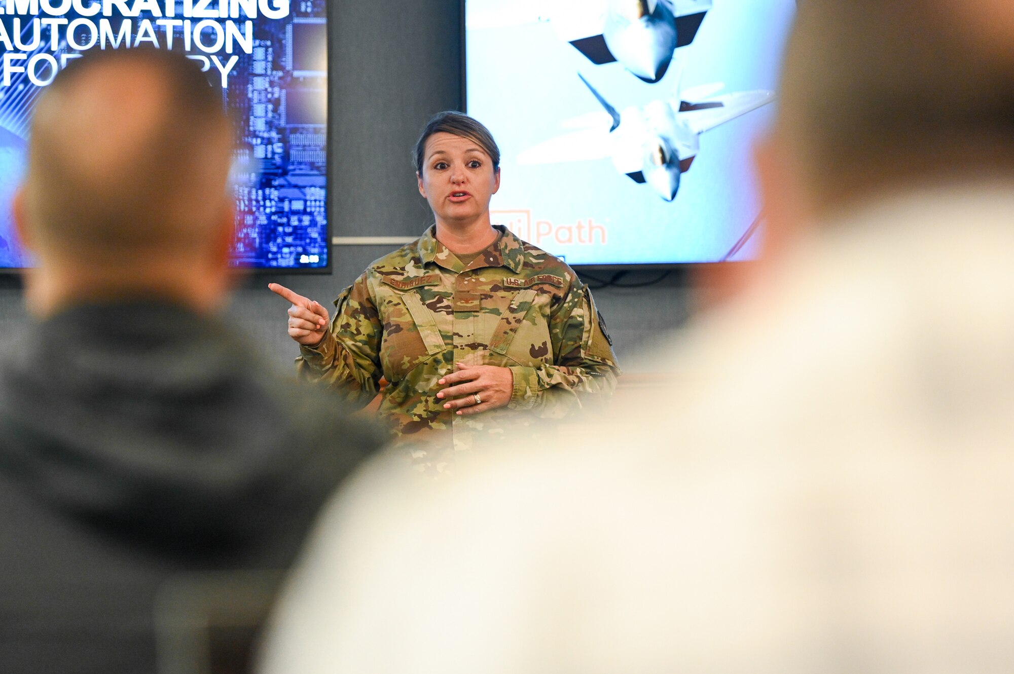 Airman speaking to group