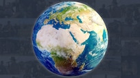 A globe is centered over a muted mosaic of images.
