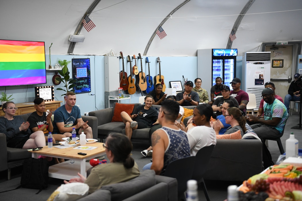 U.S. Airmen and Soldiers attend a Pride Panel, June 14, 2022, at the USO on Al Dhafra Air Base, United Arab Emirates. The intent of the panel was to spread awareness of the LGBTQ+ community and to foster camaraderie, inclusivity, and leadership.