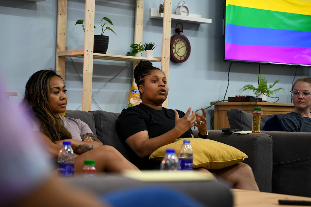 U.S. Air Force Tech. Sgt. Shineta Young, Equal Opportunity director assigned to the 380th Air Expeditionary Wing, speaks during a Pride Panel, June 14, 2022, at the USO on Al Dhafra Air Base, United Arab Emirates. The intent of the panel was to spread awareness of the LGBTQ+ community and to foster camaraderie, inclusivity, and leadership.