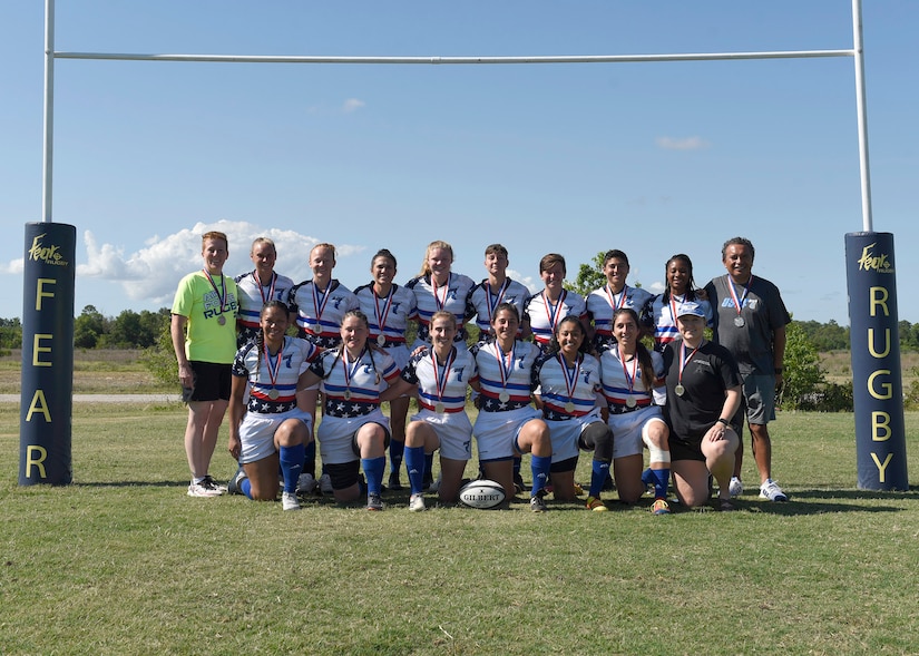 The Department of the Air Force Women’s 7s Rugby Team poses for a team photo.