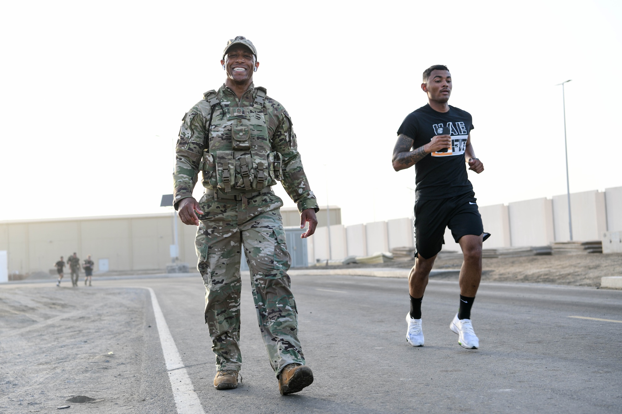 Airmen from the 380th Air Expeditionary Wing participate in a memorial ruck and run event during Police Week, May 20, 2022 at Al Dhafra Air Base, United Arab Emirates. In 1962, President John F. Kennedy signed a proclamation which designated May 15th as National Peace Officers Memorial Day, and the week in which it falls as National Police Week. Since the first service memorial gathering in Senate Park, Washington D.C., U.S. agencies across the nation and abroad have held events to honor fallen officers and acknowledge their sacrifices.