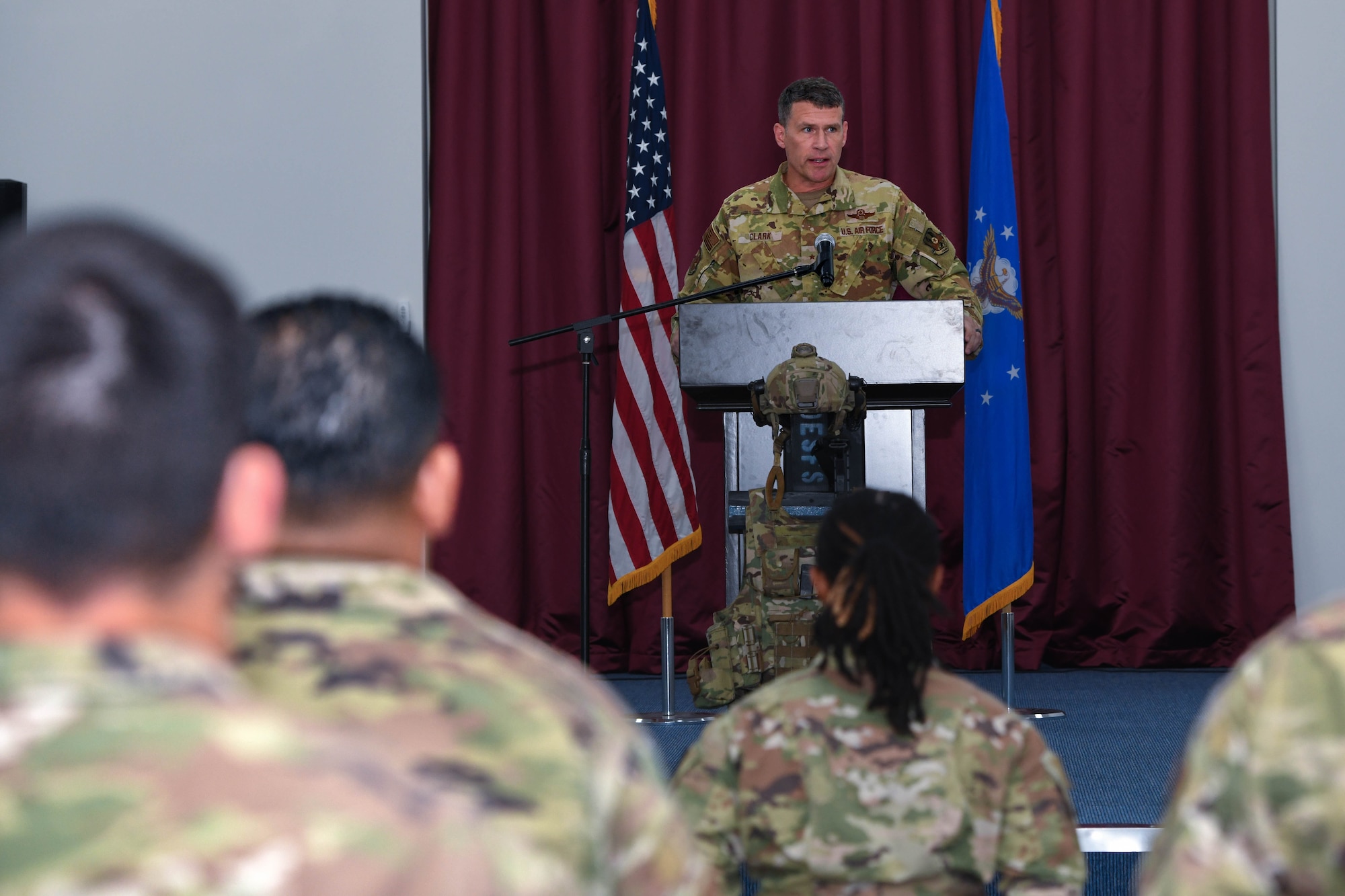 Brig. Gen. Andy Clarke, the commander of the 380th Air Expeditionary Wing, was the guest speaker during an official Police Week Ceremony May 20, 2022 at Al Dhafra Air Base, United Arab Emirates. During the ceremony the names of 15 Security Forces Defenders and 12 Office of Special Investigations Special Agents were read in remembrance.