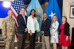 Defense Logistics Agency Energy Commander Air Force Brig. Gen. Jimmy Canlas and DLA Energy Head of the Contracting Activity and Supplier Operations Director Gabriella Earhardt (far right) take a photo with honored employees (left to right) Louis Morse, Jacquelyn Robinson-Tiller, Ricardo Selby and Heather Thomas. The DLA Energy’s Acquisition Workforce Honors Program at the McNamara Headquarters Complex on Fort Belvoir, Virginia, June 15, brought together about 20 people socially distanced in the conference room and more than 210 people online. Photo by DLA Photographer Chris Lynch.