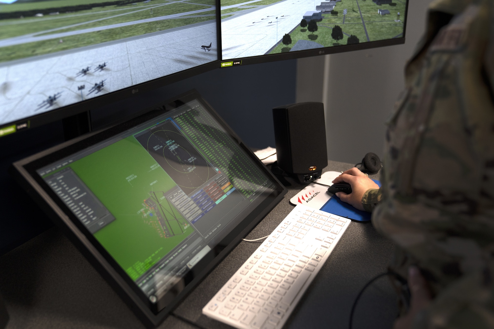 U.S. Air Force Airman 1st Class Shelley McCoy, 334th Training Squadron student, uses a condensed air traffic control tower simulator for training at Cody Hall at Keesler Air Force Base, Mississippi, June 2, 2022. A similar system has been installed in the dorm building to allow students the opportunity to increase tower control contact hours and to provide students additional study time outside the classroom.