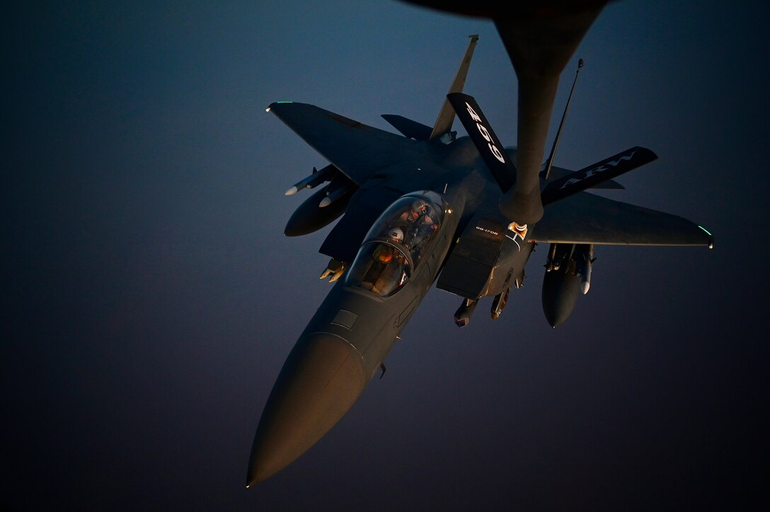 A U.S. Air Force F-15E Strike Eagle aircraft assigned to the 335th Expeditionary Fighter Squadron conducts aerial refueling operations in the U.S. Air Forces Central area of responsibility June 22, 2022. The 335th EFS delivers airpower and showcases U.S. commitment to deterrence and regional stability. (U.S. Air Force photo by Master Sgt. Matthew Plew)