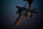 A U.S. Air Force F-15E Strike Eagle aircraft assigned to the 335th Expeditionary Fighter Squadron conducts aerial refueling operations in the U.S. Air Forces Central area of responsibility June 22, 2022. The 335th EFS delivers airpower and showcases U.S. commitment to deterrence and regional stability. (U.S. Air Force photo by Master Sgt. Matthew Plew)