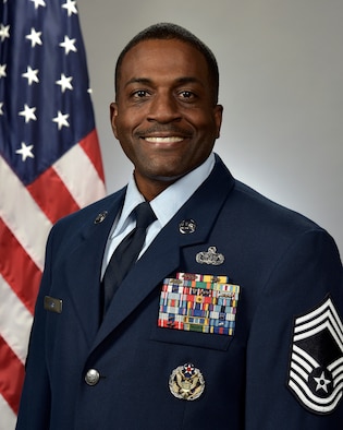 U.S. Air Force Chief Master Sgt. Christopher Hurst, Space Base Delta 1 Mission Support Senior Enlisted Leader, poses for an official portrait at Peterson Space Force Base. (U.S. Air Force photo by Craig Denton