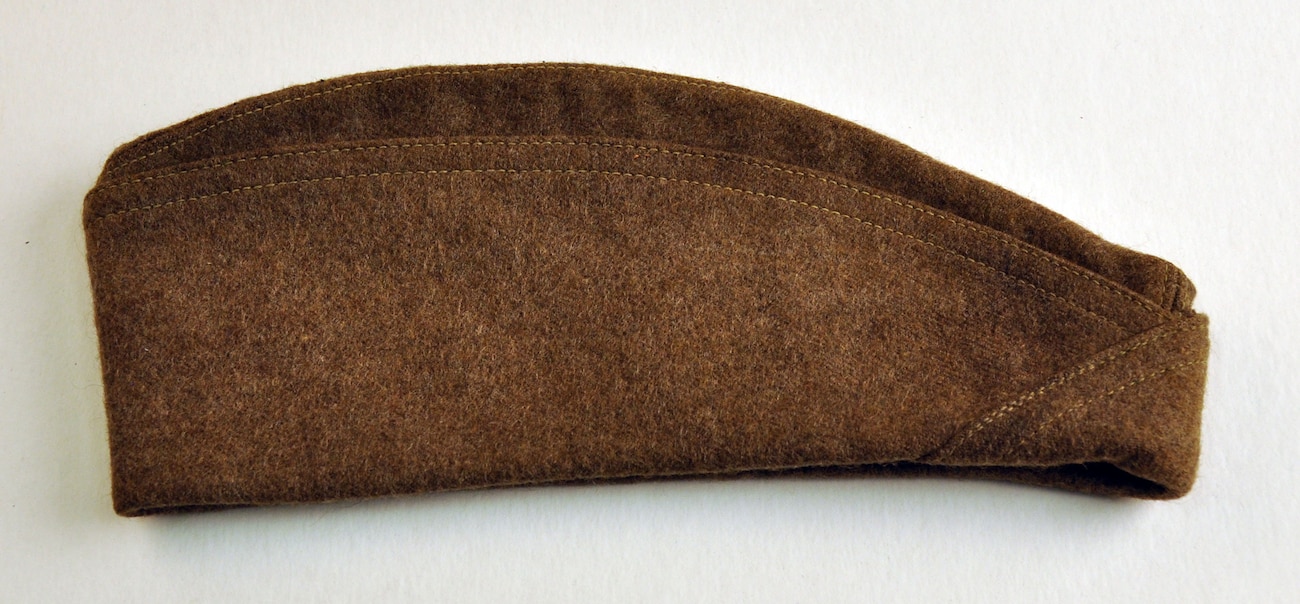 Side view of a flattened hat