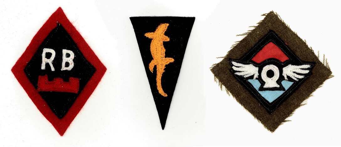 Three cloth insignia patches