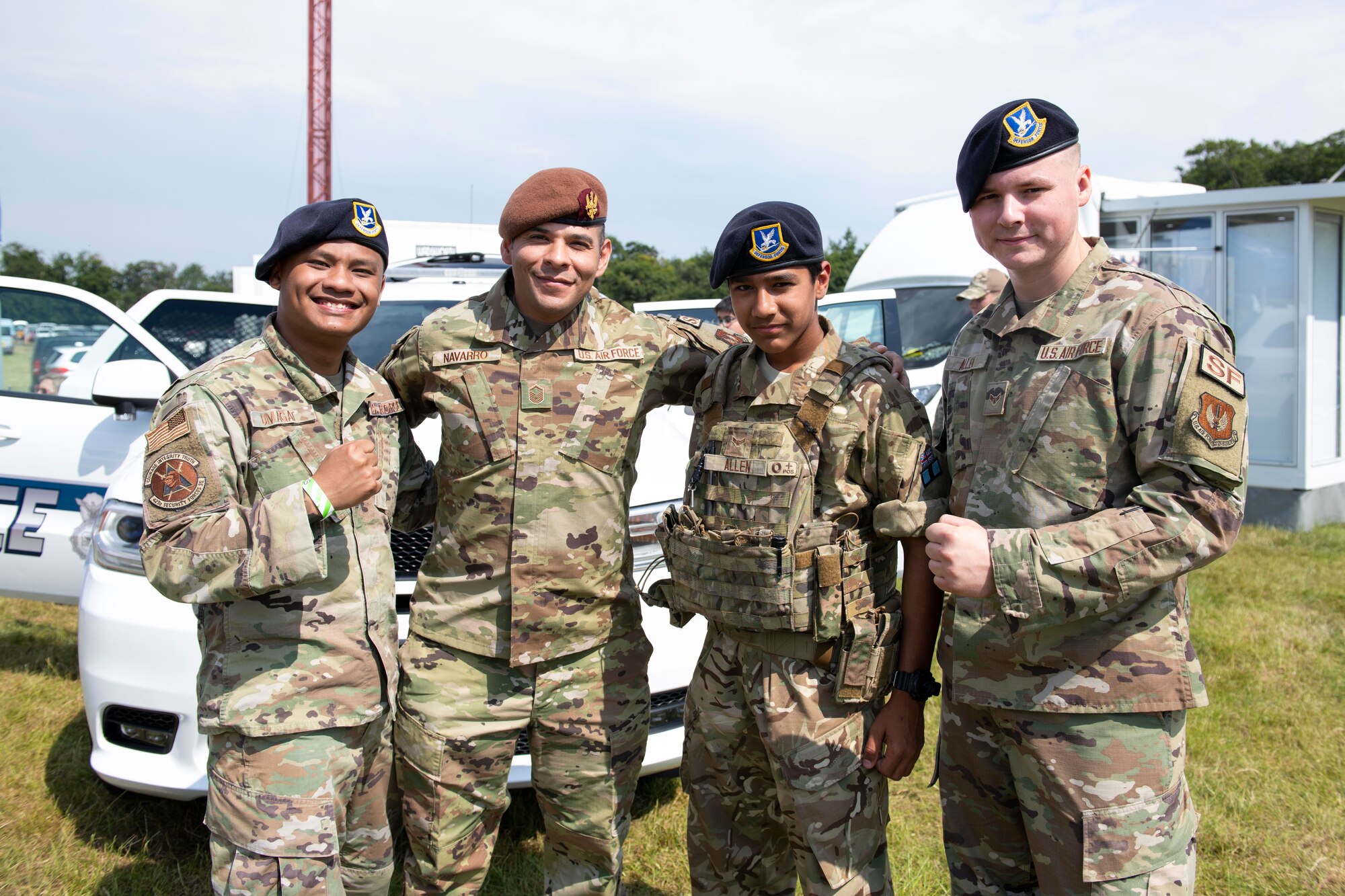 U.S. Air Force 423rd Security Forces Defenders from Royal Air Force Alconbury and Molesworth, engage with attendees during the Cambridgeshire County Day at the Newmarket July Course, England, June 23, 2022. The County Day was an opportunity to celebrate Cambridgeshire and Her Majesty The Queen’s Platinum Jubilee. (U.S. Air Force photo by Senior Airman Jennifer Zima)