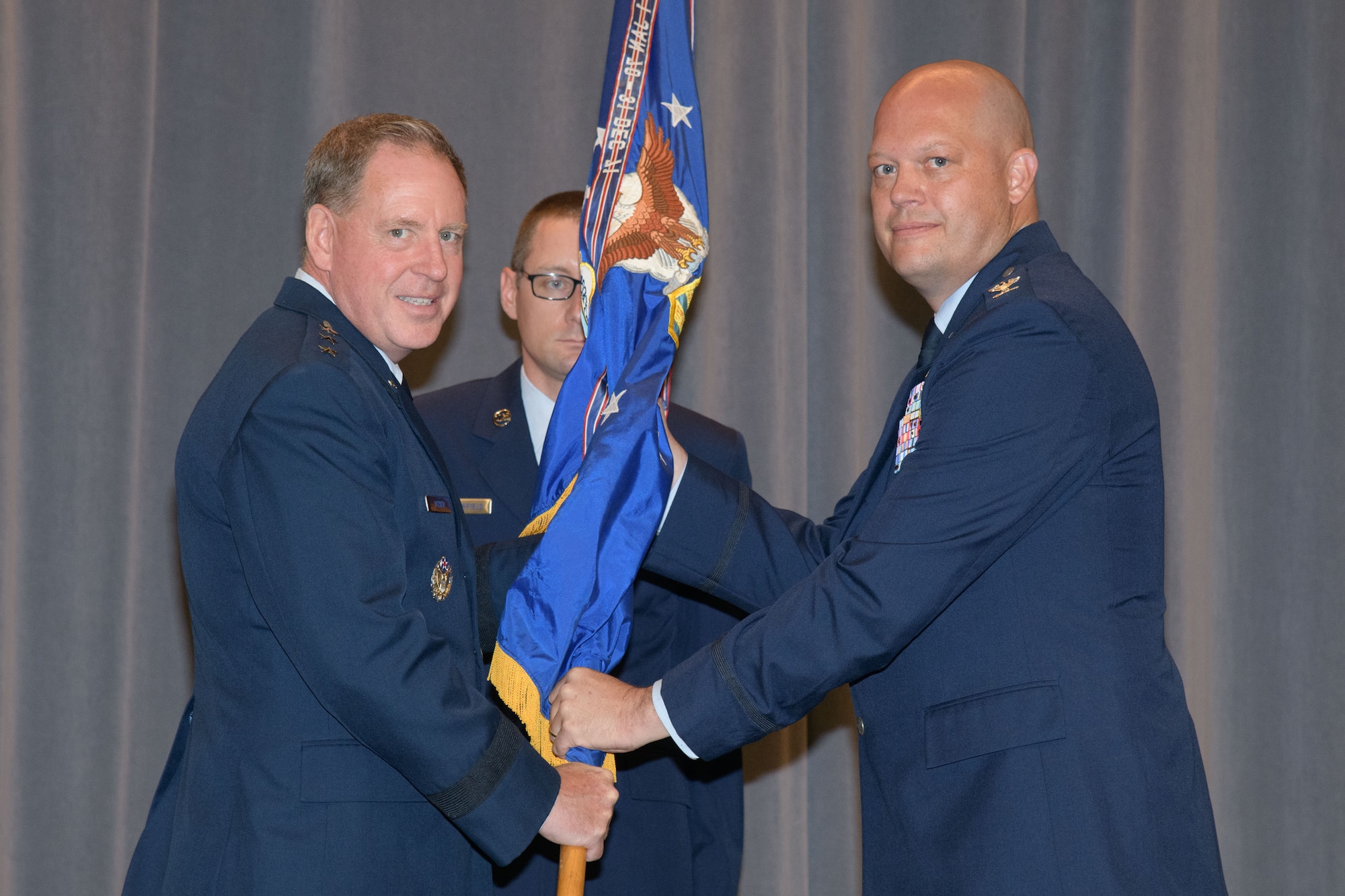 Col. Matthew Berry (right) took command of Air Command and Staff College during the school’s change of command ceremony June 21, 2022, Maxwell Air Force Base, Alabama. Lt. Gen. James Hecker (left), Air University commander and president, presided over the ceremony. Berry’s previous assignment was as vice commander, Special Warfare Training Wing, Joint Base San Antonio, Texas. (U.S. Air Force photo by Trey Ward)