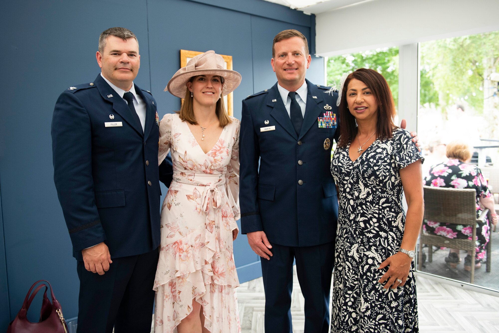 U.S. Air Force Col. Brian Filler, left, 501st Combat Support Wing commander, Maike Filler, center left, Col. Richard Martin, center right, 423rd Air Base Group commander, and Derya Martin, right, pose for a group photo during the Cambridgeshire County Day at the Newmarket July Course, England, June 23, 2022. The County Day was an opportunity to celebrate Cambridgeshire and Her Majesty The Queen’s Platinum Jubilee. (U.S. Air Force photo by Senior Airman Jennifer Zima)