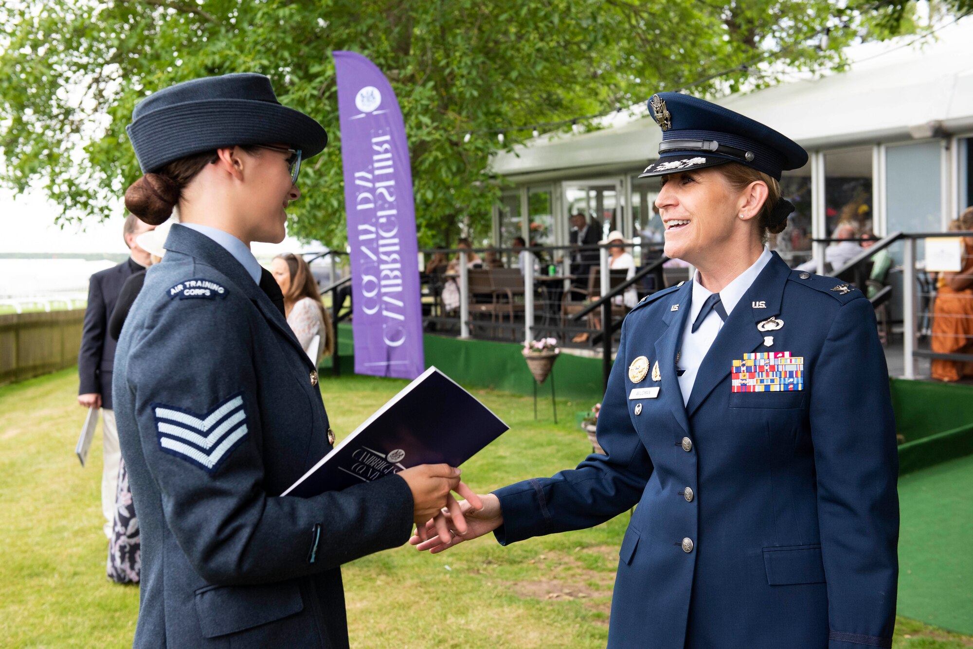 U.S. Air Force Col. Lisa Wildman, 501st Combat Support Wing vice commander, engages with attendees during the Cambridgeshire County Day at the Newmarket July Course, England, June 23, 2022. The County Day was an opportunity to celebrate Cambridgeshire and Her Majesty The Queen’s Platinum Jubilee. (U.S. Air Force photo by Senior Airman Jennifer Zima)