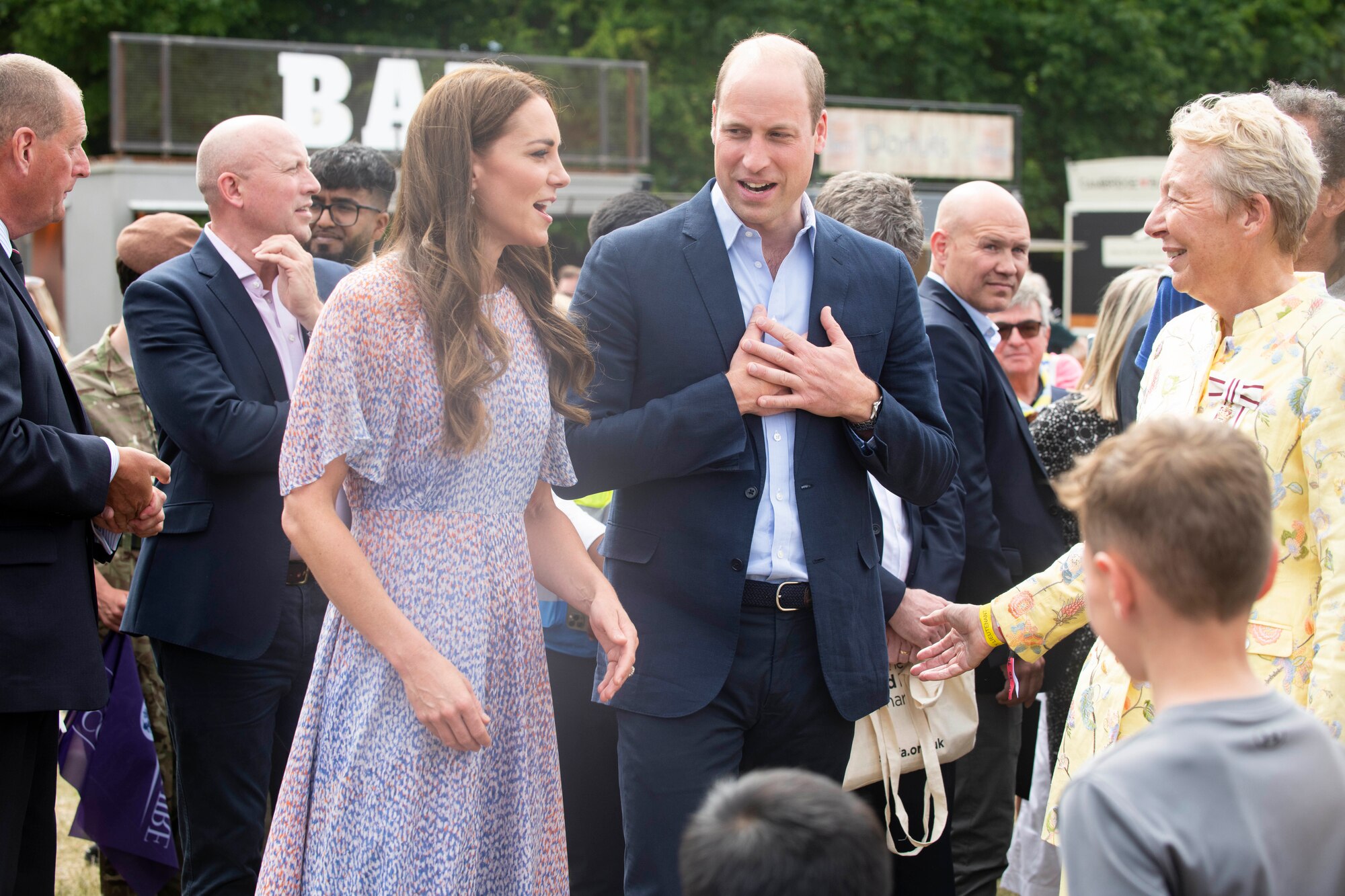 Their Royal Highnesses Prince William and Catherine, Duke and Duchess of Cambridge, and Mrs. Julie Spence, Lord Lieutenant of Cambridgeshire, engage with attendees at the Cambridgeshire County Day at the Newmarket July Course, England, June 23, 2022. The County Day was an opportunity to celebrate Cambridgeshire and Her Majesty The Queen’s Platinum Jubilee. (U.S. Air Force photo by Senior Airman Jennifer Zima)