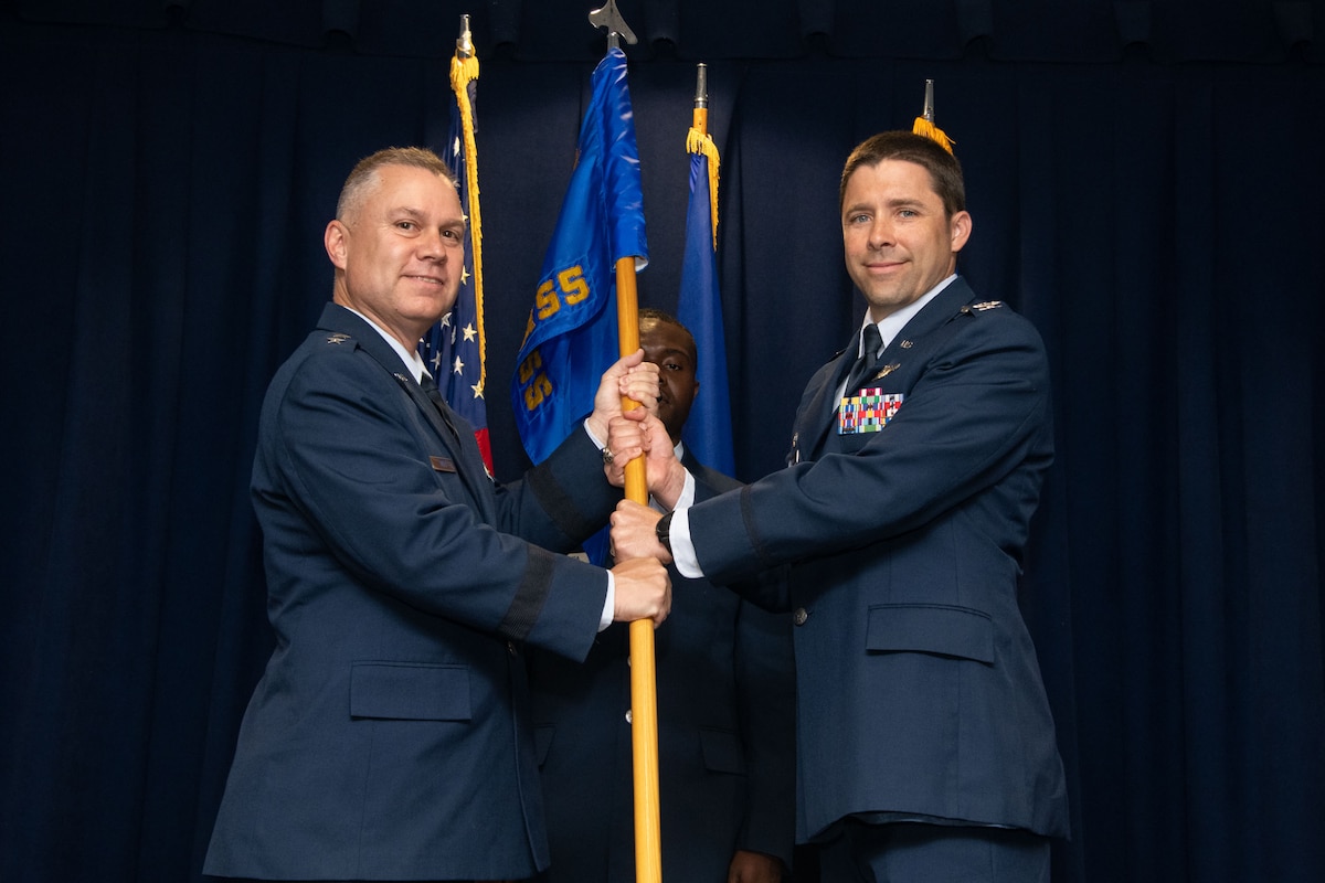 Col. Jason Trew (right) took command of the School of Advanced Air and Space Studies during the school’s change of command ceremony June 24, 2022, at Maxwell Air Force Base, Alabama. Maj. Gen. William Holt (left), Air University vice commander and commander Curtis E. LeMay Center for Doctrine Development and Education presided over the ceremony. Before taking command of SAASS, Trew served as the vice commandant of Squadron Officer School at Maxwell. (U.S. Air Force photo by Cassandra Cornwell)
