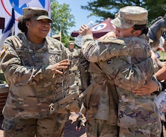 Soldiers welcome each other home from deployment