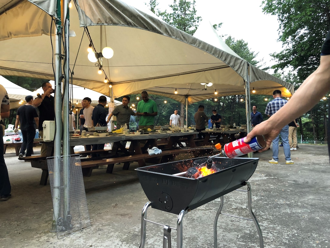 Command senior enlisted leaders with the ROK-US Alliance organize a traditional Korean barbecue at V Corps Hall, South Korea, June 21, 2022.