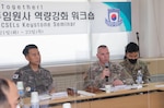 Command Sgt. Maj. Yun-yong Eo, senior enlisted advisor to the Republic of Korea Chairman of the Joint Chiefs of Staff, and Command Sgt. Maj. Jack H. Love, command senior enlisted leader for United Nations Command, Combined Forces Command, and U.S. Forces Korea, participate in a forum discussing the roles of each ROK military branch in developing service members and noncommissioned officers.